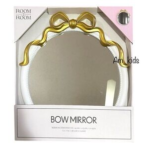 SOLD Gold bow mirror
